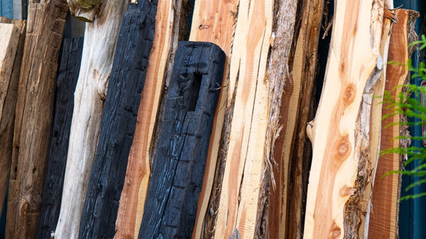 Reclaimed wood, timber, and natural materials used in handcrafted mailbox designs.