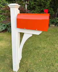 Front side view of the Classic Orange Mailbox Set featuring a bright orange mailbox, white post, and handcrafted curved bracket.