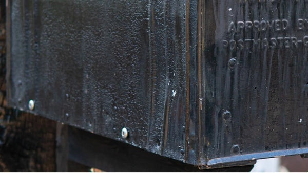 Powder-coated and finished mailbox surfaces showcasing texture and craftsmanship.